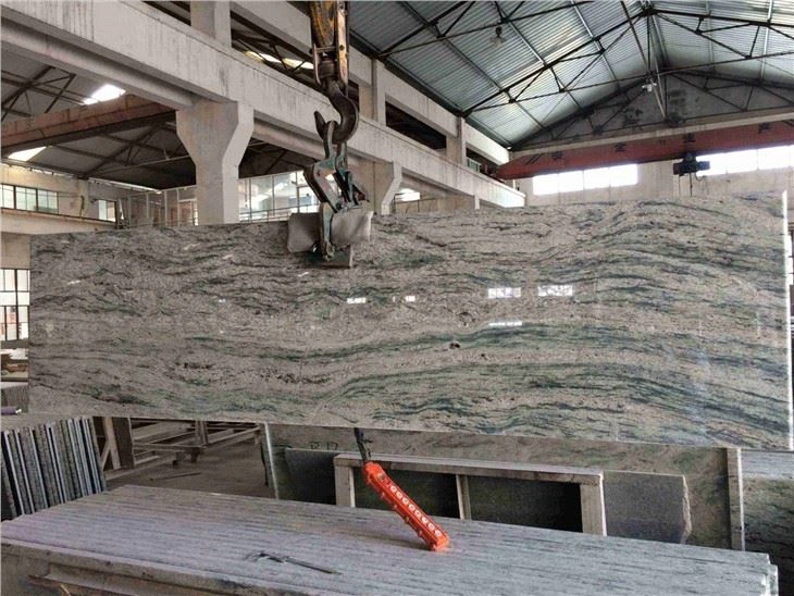 river white granite with white cabinets